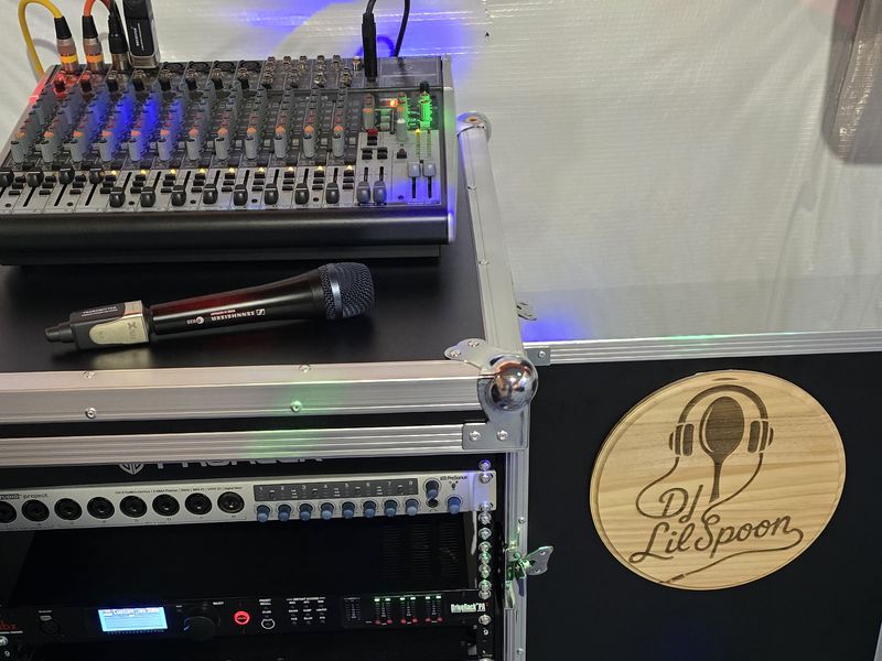 Sennheiser e935 with plug-on wireless transmitter on the Behringer mixer, above the DJ Lil Spoon rack with dbx DriveRack PA2